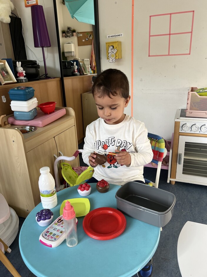 Spelen in poppenhoek.